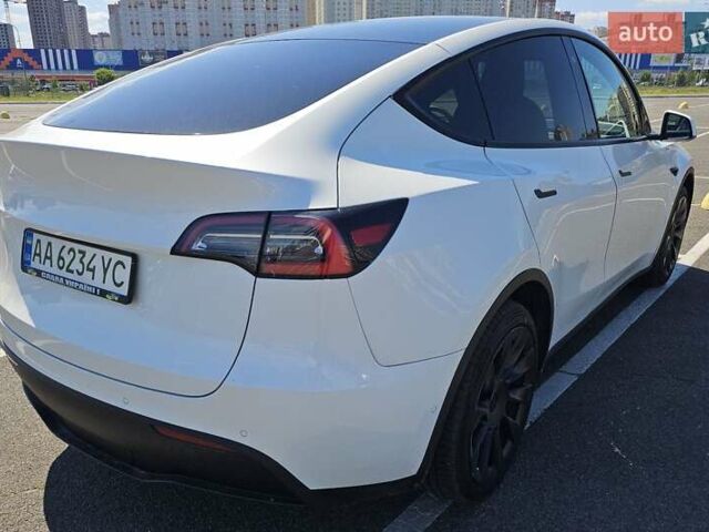 Белый Тесла Model Y, объемом двигателя 0 л и пробегом 110 тыс. км за 20499 $, фото 4 на Automoto.ua