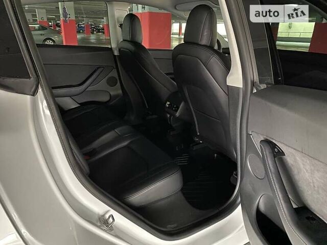 Білий Тесла Model Y, об'ємом двигуна 0 л та пробігом 61 тис. км за 25399 $, фото 10 на Automoto.ua