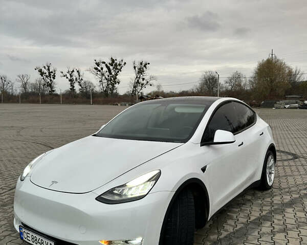 Белый Тесла Model Y, объемом двигателя 0 л и пробегом 85 тыс. км за 22000 $, фото 2 на Automoto.ua