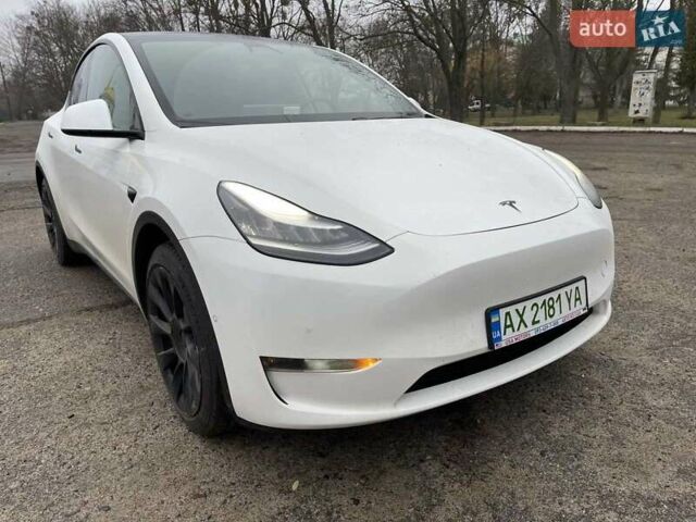 Білий Тесла Model Y, об'ємом двигуна 0 л та пробігом 127 тис. км за 22999 $, фото 2 на Automoto.ua