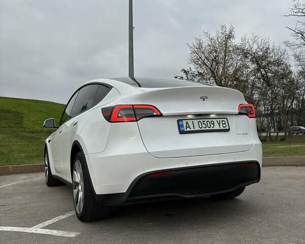 Білий Тесла Model Y, об'ємом двигуна 0 л та пробігом 70 тис. км за 28000 $, фото 25 на Automoto.ua