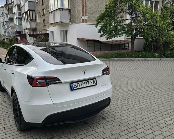 Белый Тесла Model Y, объемом двигателя 0 л и пробегом 74 тыс. км за 23000 $, фото 5 на Automoto.ua
