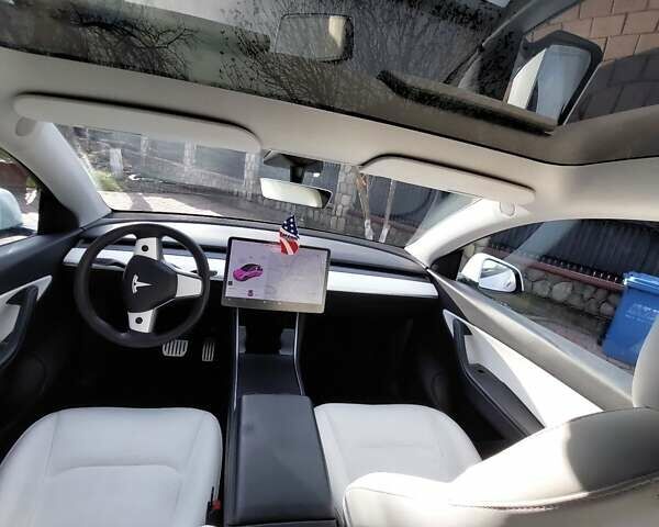 Белый Тесла Model Y, объемом двигателя 0 л и пробегом 113 тыс. км за 24700 $, фото 78 на Automoto.ua