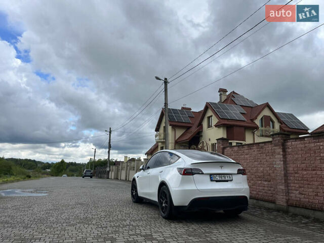 Белый Тесла Model Y, объемом двигателя 0 л и пробегом 74 тыс. км за 24000 $, фото 1 на Automoto.ua