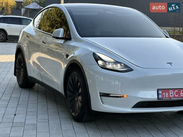 Белый Тесла Model Y, объемом двигателя 0 л и пробегом 118 тыс. км за 21700 $, фото 22 на Automoto.ua