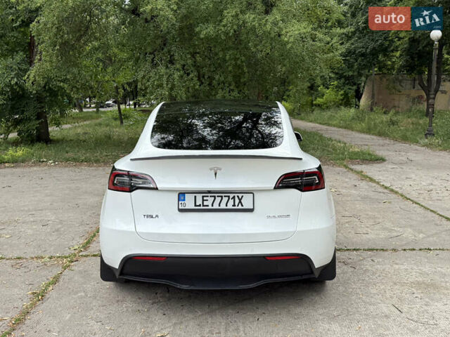 Белый Тесла Model Y, объемом двигателя 0 л и пробегом 86 тыс. км за 27000 $, фото 2 на Automoto.ua