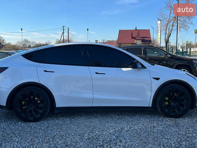 Белый Тесла Model Y, объемом двигателя 0 л и пробегом 73 тыс. км за 24800 $, фото 7 на Automoto.ua