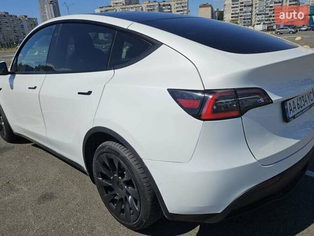 Белый Тесла Model Y, объемом двигателя 0 л и пробегом 110 тыс. км за 20499 $, фото 6 на Automoto.ua
