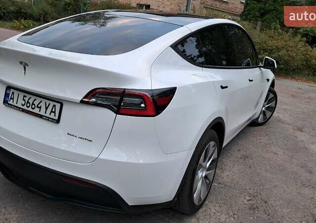 Білий Тесла Model Y, об'ємом двигуна 0 л та пробігом 84 тис. км за 21900 $, фото 15 на Automoto.ua