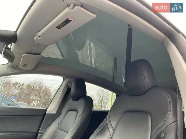 Белый Тесла Model Y, объемом двигателя 0 л и пробегом 75 тыс. км за 28300 $, фото 17 на Automoto.ua