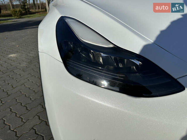 Белый Тесла Model Y, объемом двигателя 0 л и пробегом 85 тыс. км за 22900 $, фото 2 на Automoto.ua