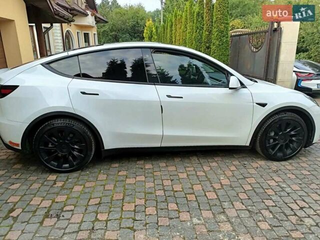 Білий Тесла Model Y, об'ємом двигуна 0 л та пробігом 65 тис. км за 28000 $, фото 12 на Automoto.ua