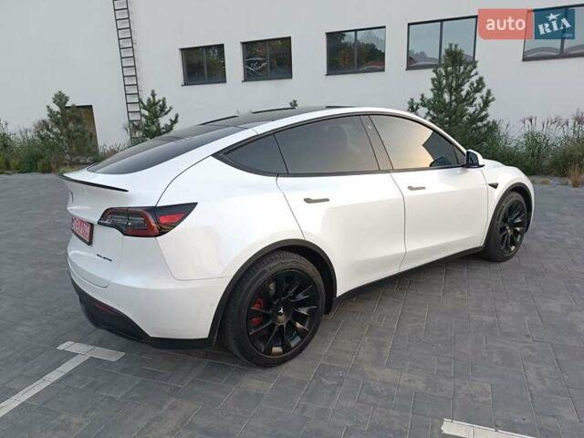 Белый Тесла Model Y, объемом двигателя 0 л и пробегом 128 тыс. км за 19600 $, фото 3 на Automoto.ua