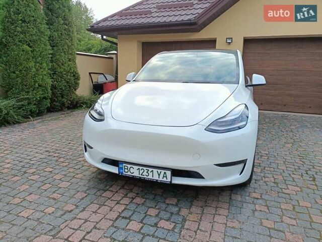 Білий Тесла Model Y, об'ємом двигуна 0 л та пробігом 65 тис. км за 28000 $, фото 17 на Automoto.ua