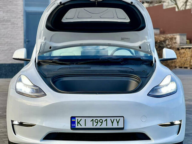 Белый Тесла Model Y, объемом двигателя 0 л и пробегом 57 тыс. км за 28500 $, фото 11 на Automoto.ua