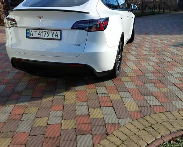 Белый Тесла Model Y, объемом двигателя 0 л и пробегом 113 тыс. км за 24700 $, фото 45 на Automoto.ua