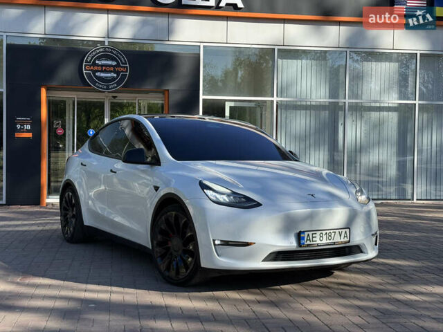 Белый Тесла Model Y, объемом двигателя 0 л и пробегом 84 тыс. км за 28000 $, фото 2 на Automoto.ua
