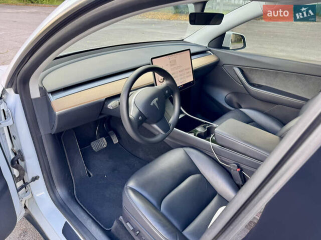 Білий Тесла Model Y, об'ємом двигуна 0 л та пробігом 100 тис. км за 23400 $, фото 8 на Automoto.ua