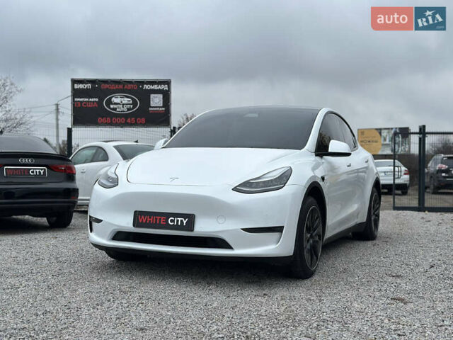 Білий Тесла Model Y, об'ємом двигуна 0 л та пробігом 66 тис. км за 19500 $, фото 1 на Automoto.ua