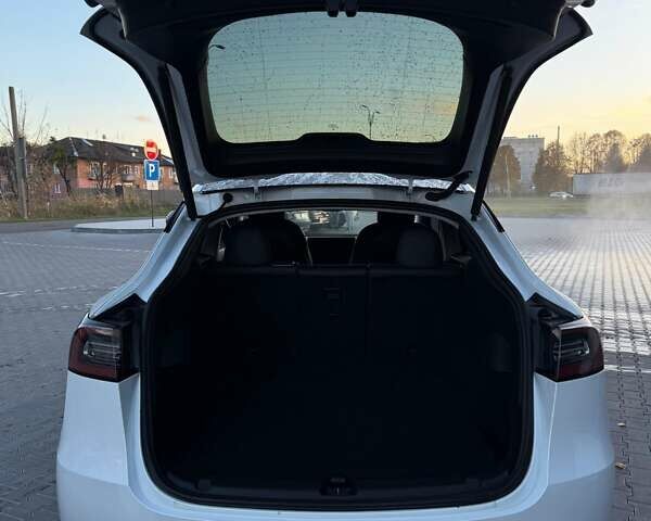 Белый Тесла Model Y, объемом двигателя 0 л и пробегом 132 тыс. км за 20800 $, фото 67 на Automoto.ua