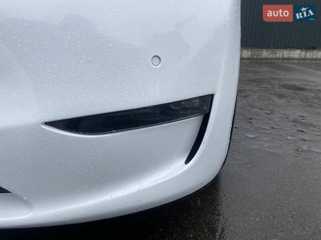 Білий Тесла Model Y, об'ємом двигуна 0 л та пробігом 70 тис. км за 24500 $, фото 38 на Automoto.ua