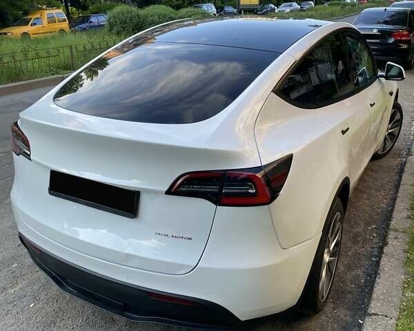 Белый Тесла Model Y, объемом двигателя 0 л и пробегом 49 тыс. км за 24850 $, фото 2 на Automoto.ua