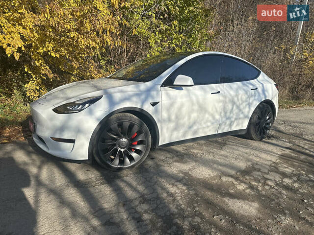 Белый Тесла Model Y, объемом двигателя 0 л и пробегом 71 тыс. км за 23400 $, фото 1 на Automoto.ua