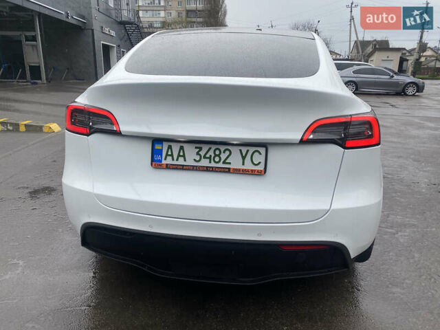 Білий Тесла Model Y, об'ємом двигуна 0 л та пробігом 70 тис. км за 24500 $, фото 6 на Automoto.ua