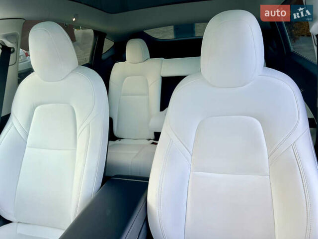 Белый Тесла Model Y, объемом двигателя 0 л и пробегом 57 тыс. км за 28500 $, фото 40 на Automoto.ua