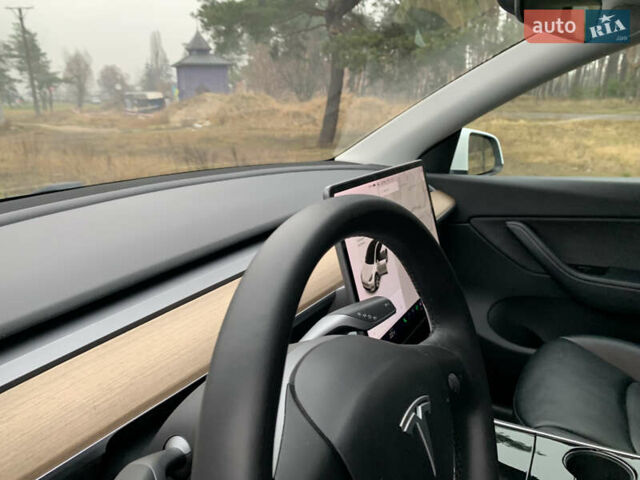 Белый Тесла Model Y, объемом двигателя 0 л и пробегом 89 тыс. км за 23500 $, фото 7 на Automoto.ua