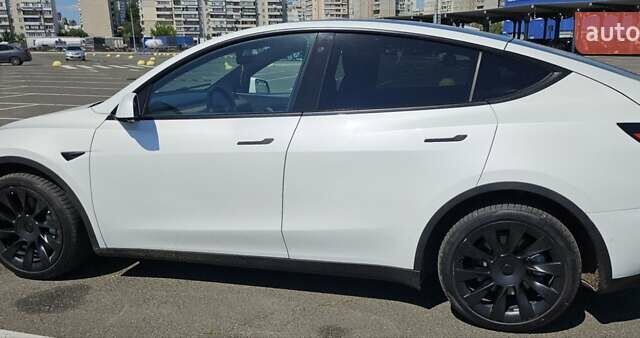 Белый Тесла Model Y, объемом двигателя 0 л и пробегом 110 тыс. км за 20499 $, фото 7 на Automoto.ua
