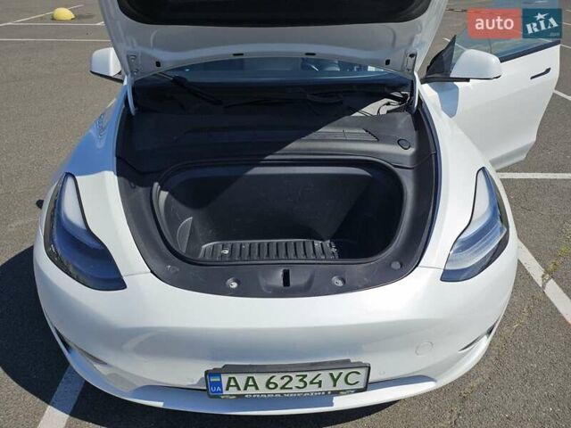 Белый Тесла Model Y, объемом двигателя 0 л и пробегом 110 тыс. км за 20499 $, фото 18 на Automoto.ua