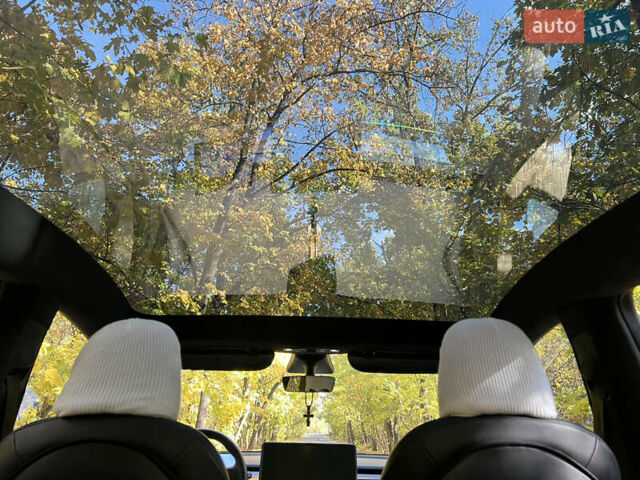Білий Тесла Model Y, об'ємом двигуна 0 л та пробігом 126 тис. км за 28800 $, фото 15 на Automoto.ua