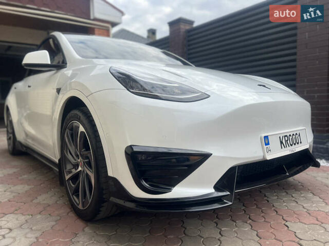 Білий Тесла Model Y, об'ємом двигуна 0 л та пробігом 126 тис. км за 28800 $, фото 2 на Automoto.ua