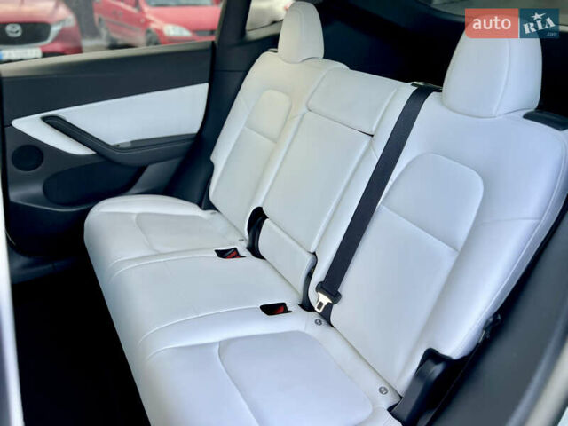Белый Тесла Model Y, объемом двигателя 0 л и пробегом 57 тыс. км за 28500 $, фото 27 на Automoto.ua