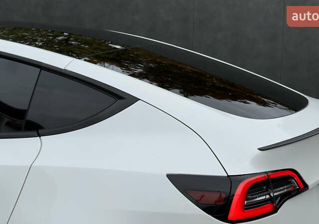 Белый Тесла Model Y, объемом двигателя 0 л и пробегом 85 тыс. км за 22600 $, фото 5 на Automoto.ua