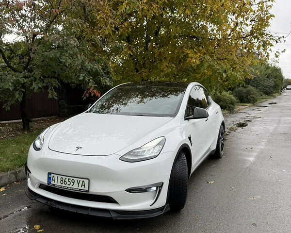 Белый Тесла Model Y, объемом двигателя 0 л и пробегом 62 тыс. км за 28500 $, фото 1 на Automoto.ua