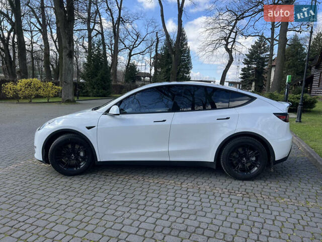 Білий Тесла Model Y, об'ємом двигуна 0 л та пробігом 88 тис. км за 38800 $, фото 5 на Automoto.ua