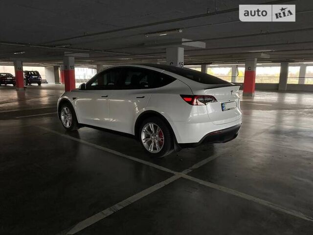 Білий Тесла Model Y, об'ємом двигуна 0 л та пробігом 61 тис. км за 25399 $, фото 5 на Automoto.ua