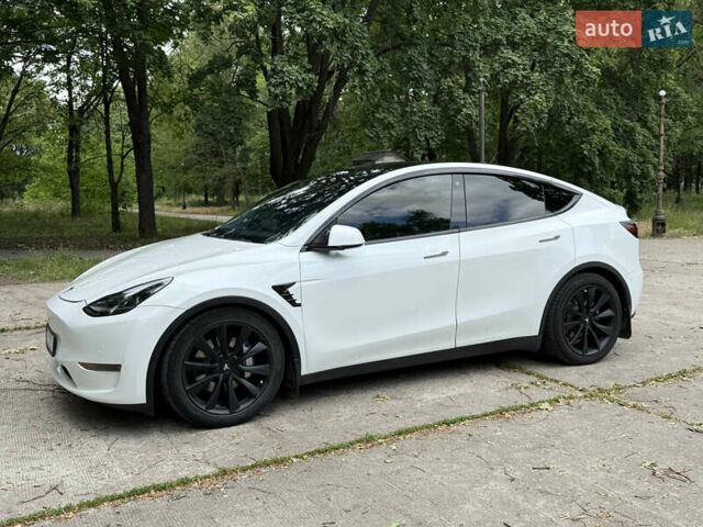 Белый Тесла Model Y, объемом двигателя 0 л и пробегом 86 тыс. км за 27000 $, фото 1 на Automoto.ua