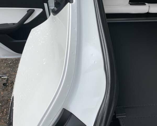 Білий Тесла Model Y, об'ємом двигуна 0 л та пробігом 21 тис. км за 19000 $, фото 44 на Automoto.ua