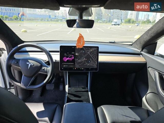 Белый Тесла Model Y, объемом двигателя 0 л и пробегом 110 тыс. км за 20499 $, фото 17 на Automoto.ua