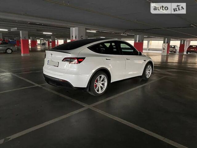 Білий Тесла Model Y, об'ємом двигуна 0 л та пробігом 61 тис. км за 25399 $, фото 3 на Automoto.ua
