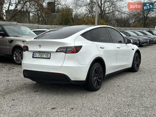 Білий Тесла Model Y, об'ємом двигуна 0 л та пробігом 66 тис. км за 19500 $, фото 17 на Automoto.ua