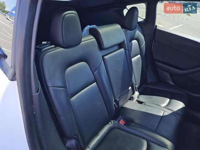 Белый Тесла Model Y, объемом двигателя 0 л и пробегом 110 тыс. км за 20499 $, фото 13 на Automoto.ua