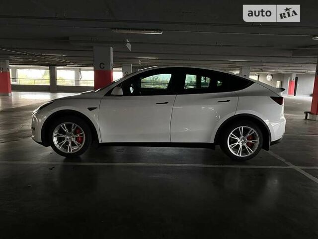 Білий Тесла Model Y, об'ємом двигуна 0 л та пробігом 61 тис. км за 25399 $, фото 6 на Automoto.ua
