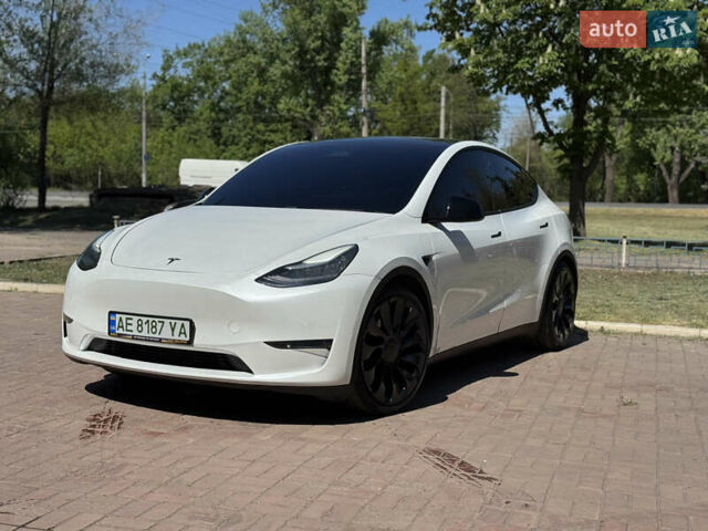 Белый Тесла Model Y, объемом двигателя 0 л и пробегом 84 тыс. км за 28000 $, фото 25 на Automoto.ua