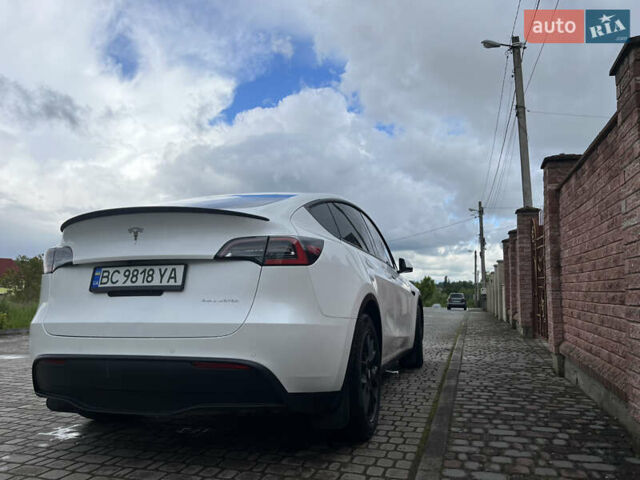 Белый Тесла Model Y, объемом двигателя 0 л и пробегом 74 тыс. км за 24000 $, фото 2 на Automoto.ua