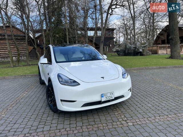 Білий Тесла Model Y, об'ємом двигуна 0 л та пробігом 88 тис. км за 38800 $, фото 1 на Automoto.ua