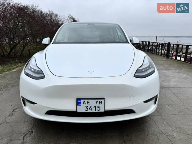 Белый Тесла Model Y, объемом двигателя 0 л и пробегом 77 тыс. км за 25000 $, фото 41 на Automoto.ua